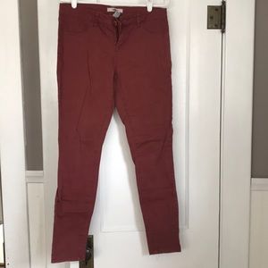 Mauve/rose colored skinny jeans